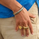 Sztywna pozłacana bransoletka z niebieskimi cętkami pantery. NIEBIESKA PANTERA