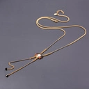 Długi pozłacany wisior na łańcuszku z kryształkami. NOWY DZIEŃ