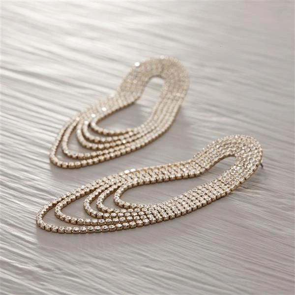 Długie owalne kolczyki wiszące wysadzane cyrkoniami. BLINK BLINK