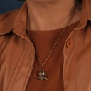 Pozłacany naszyjnik z kolibrem, perłą i szafirami. SYMBOL MAGII