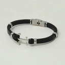 Męska bransoletka ze skóry ze stalowymi elementami. NIEPOKONANY