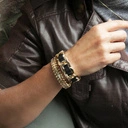 Złota bransoletka łańcuch z paskiem z czarnej ekoskóry. NOC