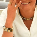 Bransoletka z inkrustowanych i pozłacanych ogniw ze stali. CITE PICASSO