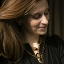 SANTO VERSACE. Colgante con un león negro