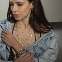 Pozłacany naszyjnik na łańcuszku z małymi krzyżami. PUNKOWY