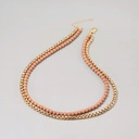 Elegancki naszyjnik podwójny w złotym kolorze. AMAZONIA