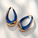  Owalne pozłacane kolczyki z kobaltowym akcentem. RADOŚĆ PO WŁOSKU