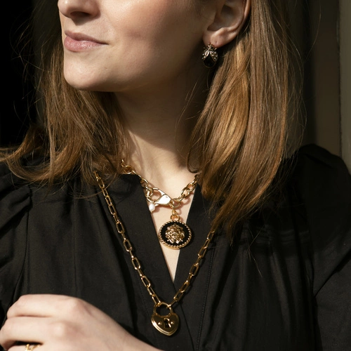 Złoty naszyjnik łańcuch z medalionem z głową lwa. SANTO VERSACE