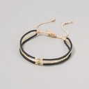 Bransoletka ze złotych i czarnych paciorków Miyuki. ZŁOTY ŚRODEK