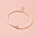 Bransoletka na gumce z perełkami i kryształową kulką. NIC PROSTSZEGO