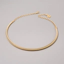 Sztywny pozłacany naszyjnik z ozdobnym spiralnym splotem. SPIRALA ŚWIATŁA