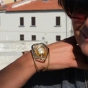 Pozłacana bransoletka z ażurowym dekorem z perłą. UTKANE MARZENIA