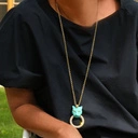 Pozłacany wisiorek z głową dużej pantery z ringiem. INSTYNKT ŁOWCZYNI