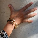 Bransoletka z głowami słoni i emaliowaną obręczą. CAROLINA