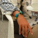 Złocona bransoletka z dwiema głowami papug z cyrkoniami. NIEROZŁĄCZKI