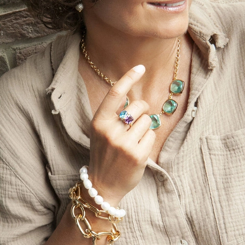 Podwójna bransoletka z łańcucha i sznura pereł. UŚMIECH DONATY