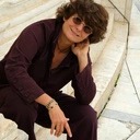 Krótki naszyjnik z czarnych koralików i złoconych kulek. LINEA DEL SUR