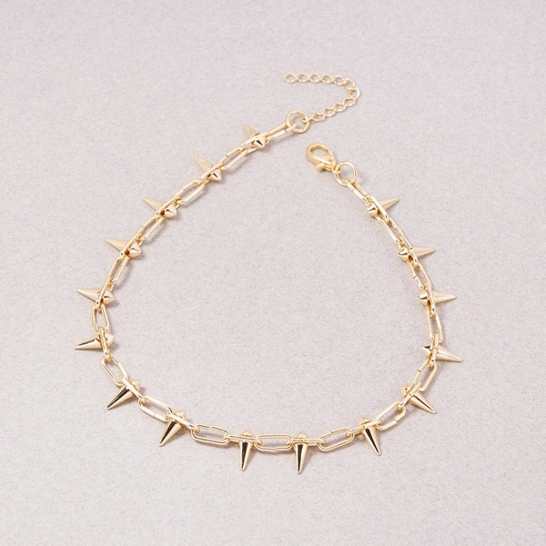 Pozłacany choker na łańcuchu wysadzany kolcami. DANGEROUS