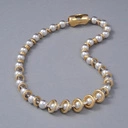 Naszyjnik z posrebrzanych kulek i pozłacanych pierścieni. GALERIE VIVIENNE