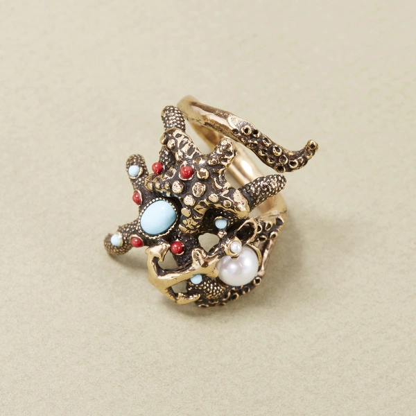Złocony pierścionek morskie motywy z perłą i kamieniami. MORSKIE PRECJOZA
