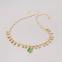 Złocony naszyjnik na łańcuszku z fosforyzującym misiem. MIŚTRZ CIEMNOŚCI