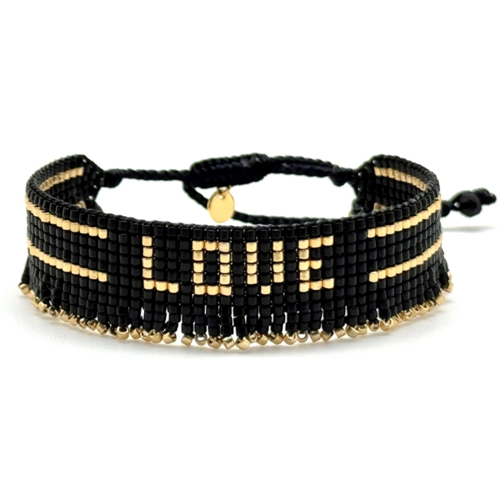 Bransoletka z czarnych paciorków Miyuki ze złotym napisem. CZUŁOŚCI W CIEMNOŚCI