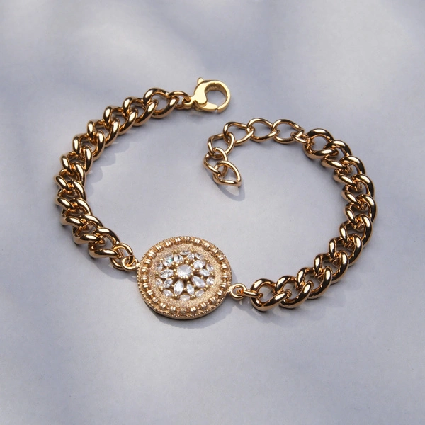 Złocoan bransoletka z dekorem z motywem kwiatka z cyrkonii. NORCIA