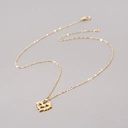 Złocony naszyjnik na łańcuszku z zawieszką w formie rozety. ROZETA SŁOŃCA