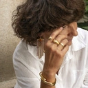 Sztywna bransoletka w kształcie zagiętego gwoździa. POZYTYWNY GWOŹDZIK