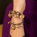 ESTOY CAMBIANDO. Pulsera de cuero con colgantes