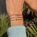 Bransoletka z paciorków Miyuki z akcentem z onyksu. MADAME NOIR