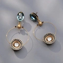 Złocone kolczyki z kryształkami w black diamond i szampanie. OKRĄGŁY ROK