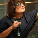 Pozłacany wisiorek z głową małej pantery z ringiem. KOTKA PSOTKA