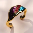 Złocona bransoletka z motywem muszli z cekinami i koralikami. SYRENI ZEW