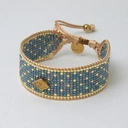 Wąska bransoletka tkana z paciorków Miyuki z dekorem. BONJOUR AZUR