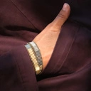 Dwurzędowa bransoletka z koralików w złocie i srebrze. EL PASADOR