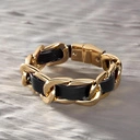 Złota bransoletka łańcuch z paskiem z czarnej ekoskóry. NOC