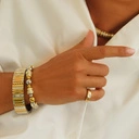 Gładki pozłacany pierścionek z przezroczystą cyrkonią. PARADISE CITY