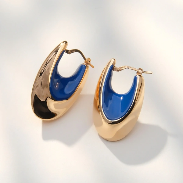 Owalne pozłacane kolczyki wiszące a la kłódeczki. SZKATUŁKA NA SZEPTY