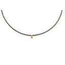 Naszyjnik z czarnych i złoconych koralików z gwiazdką. LA ESTRELLA DEL LEON