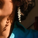 Pozłacane kolczyki girlandy z przezroczystymi cyrkoniami. KASKADY IGUAZU