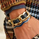 Pozłacana pancerka z paskiem z granatowej ekoskóry. GRANAT NOCY