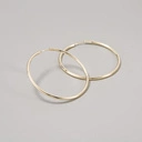 Delikatne pozłacane kolczyki w kształcie zamkniętych kół. MAGICZNE OKRĘGI