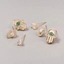 Zestaw trzech pozłacanych kolczyków z motywem dłoni. RĘKA WYROCZNI