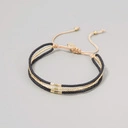 Bransoletka ze złotych i czarnych paciorków Miyuki. ZŁOTY ŚRODEK