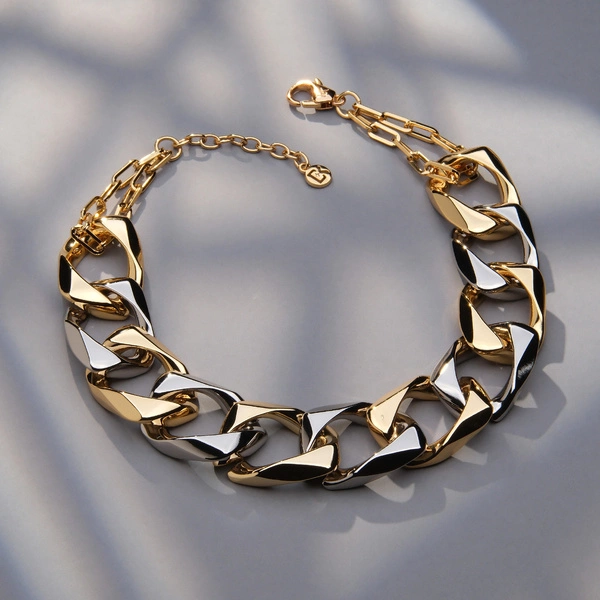 Naszyjnik ze srebrzonych i złoconych grubych ogniw. CADENA DE FUERZA