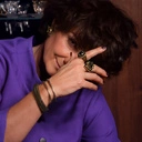 Sztywna złocona bransoletka z dekorem w formie łańcuchów. BASTIA