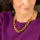 Naszyjnik typu choker z grubego złotego łańcucha. TI AMO