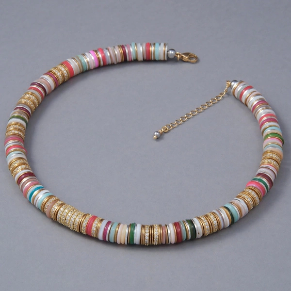 Naszyjnik z kolorowych koralików i złoconych krążków. CARROUSEL COLORE