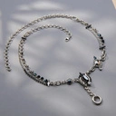 Srebrzony naszyjnik z białymi i niebieskimi kryształkami. CHARME Z CHARYZMĄ